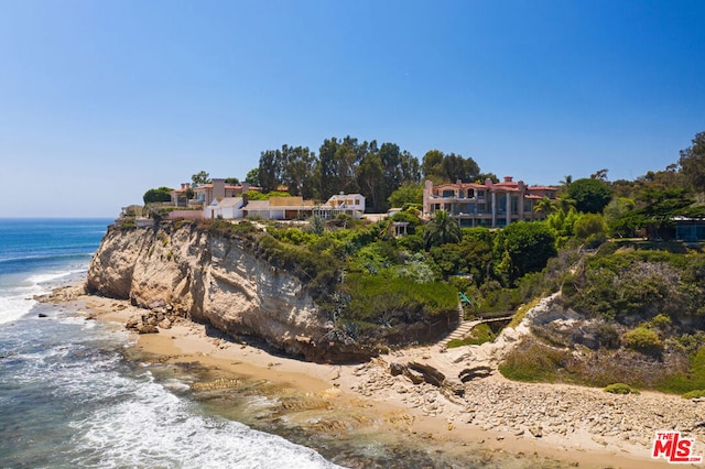 property view of water featuring a view of the beach