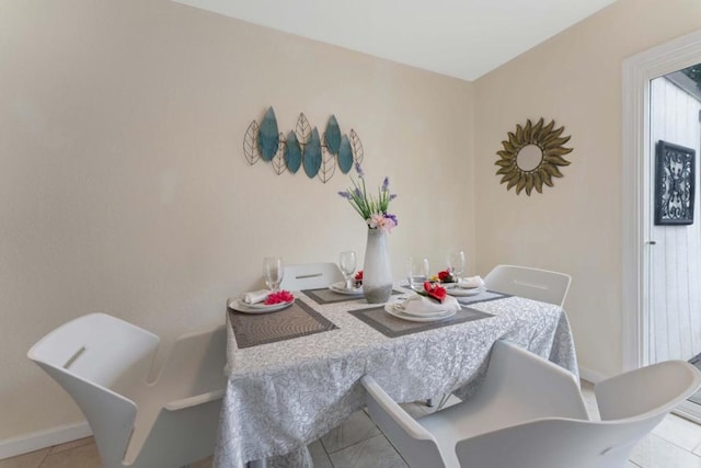 view of tiled dining area