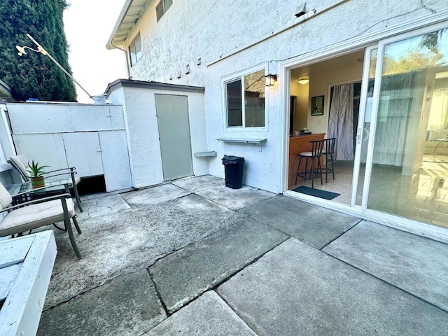 view of patio featuring a bar