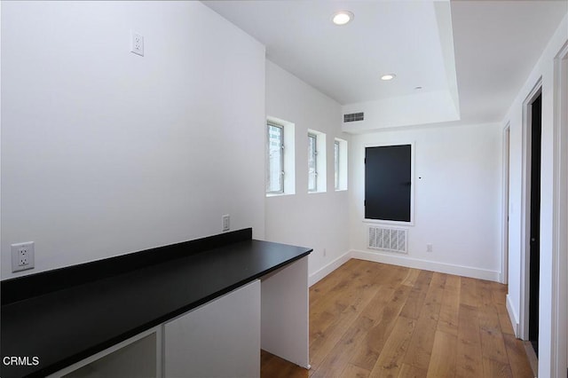 hallway featuring light hardwood / wood-style floors