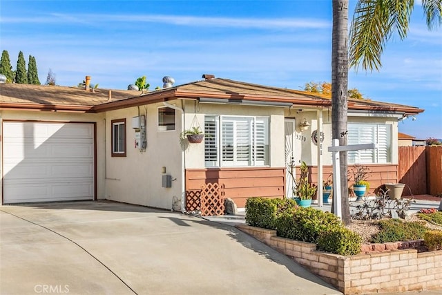 ranch-style home with a garage