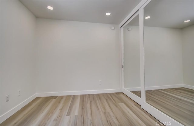 empty room featuring light hardwood / wood-style floors