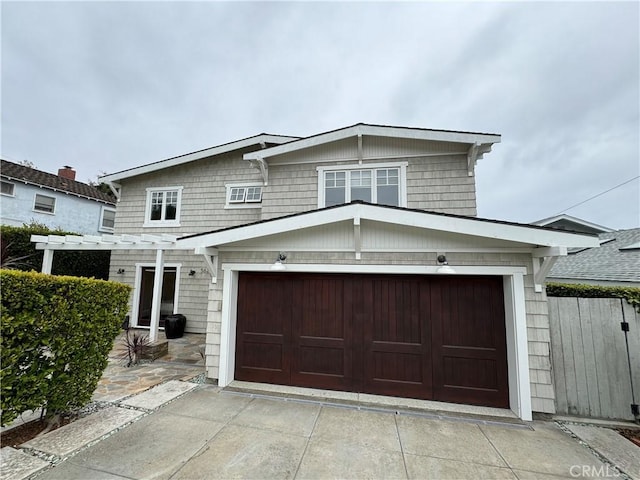 562 24th Pl, Hermosa Beach, CA 90254 - view of front of house with driveway, an attached garage, and a pergola