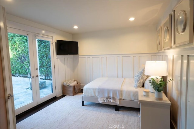562 24th Pl, Hermosa Beach, CA 90254 - bedroom with access to outside, french doors, a decorative wall, recessed lighting, and a wainscoted wall