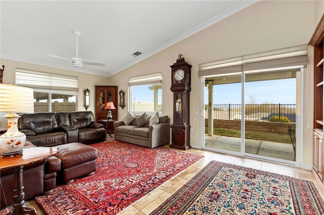 living room featuring crown molding, light tile patterned flooring, and ceiling fan