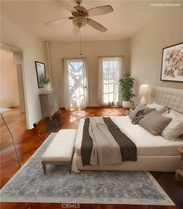 2121 James M Wood Blvd Unit 224, Los Angeles, CA 90006 - bedroom featuring light tile patterned flooring and a ceiling fan