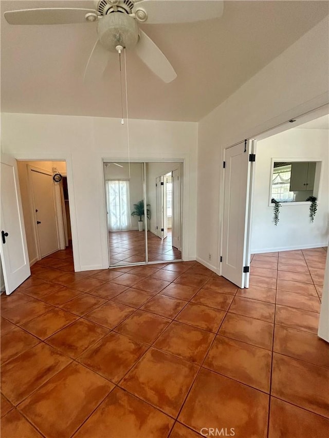 2121 James M Wood Blvd Unit 224, Los Angeles, CA 90006 - tiled spare room featuring a ceiling fan and baseboards