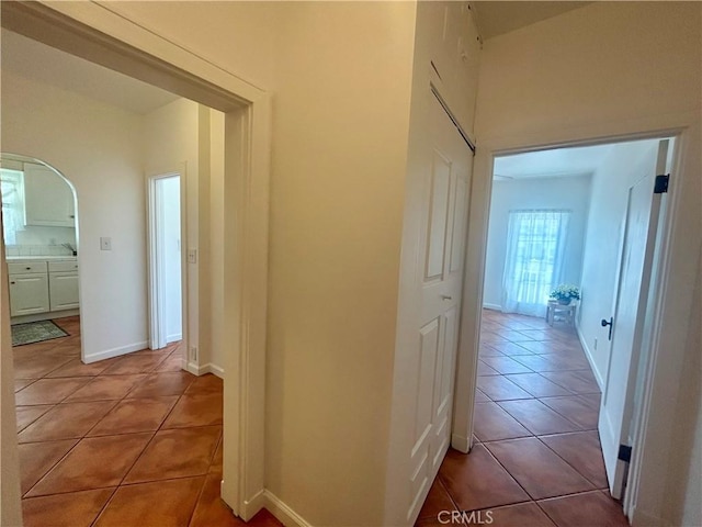 2121 James M Wood Blvd Unit 224, Los Angeles, CA 90006 - corridor featuring light tile patterned floors
