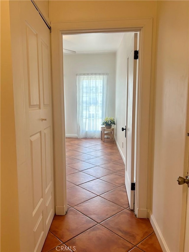 2121 James M Wood Blvd Unit 224, Los Angeles, CA 90006 - hall featuring light tile patterned flooring and baseboards