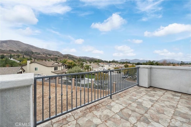 balcony featuring a mountain view