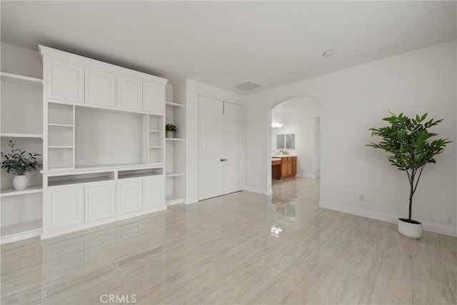 unfurnished living room with light hardwood / wood-style floors