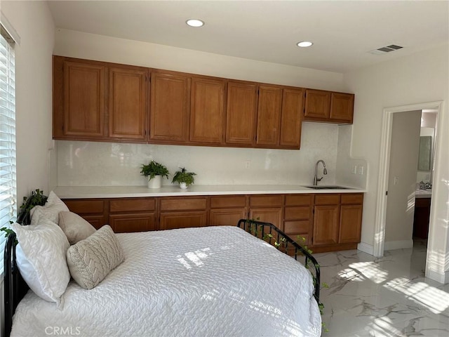 bedroom featuring sink