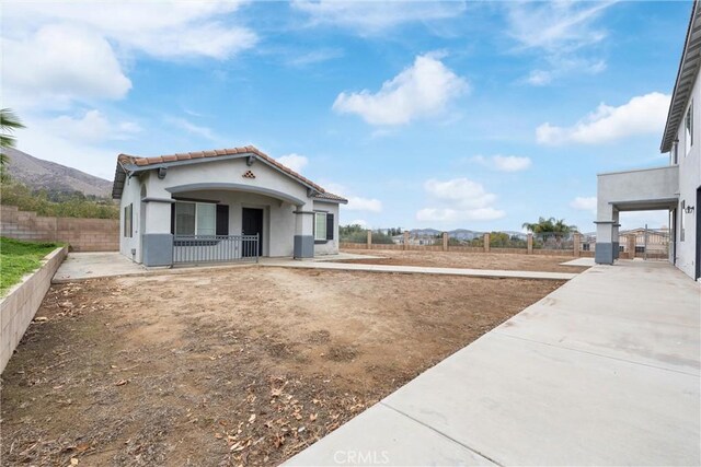 view of front of home with a mountain view