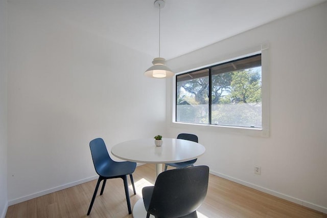 dining area featuring light wood-type flooring