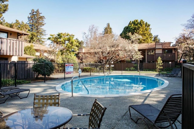 view of pool with a patio