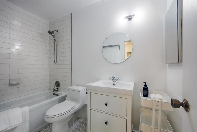 full bathroom with tiled shower / bath, vanity, and toilet