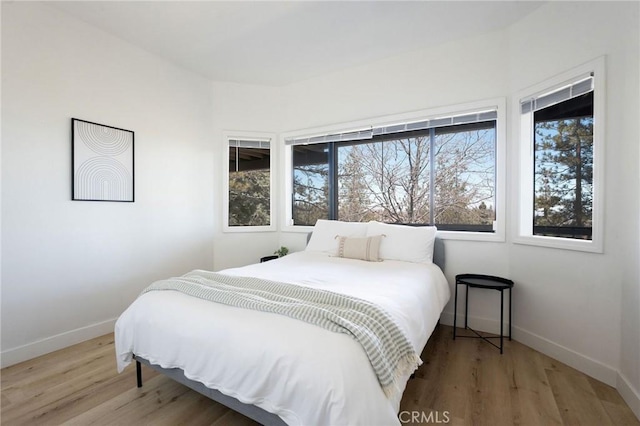 bedroom featuring hardwood / wood-style flooring