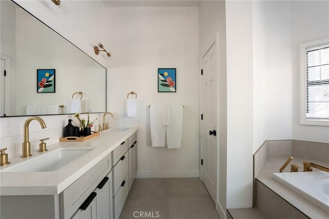 bathroom featuring a tub to relax in and vanity