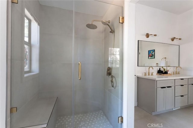 bathroom featuring vanity and walk in shower