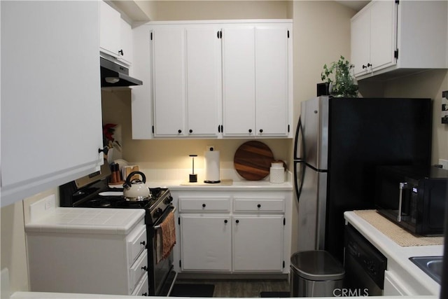 kitchen featuring white cabinetry and black appliances