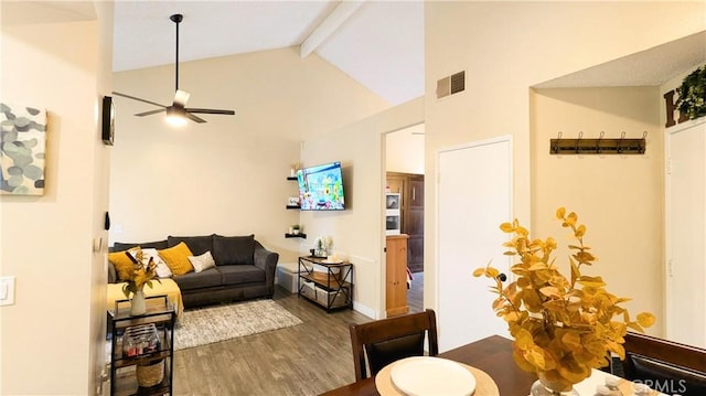 living room with beamed ceiling, high vaulted ceiling, hardwood / wood-style floors, and ceiling fan