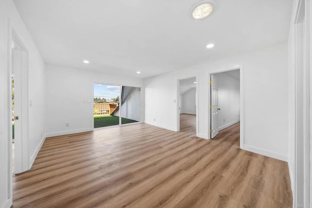 unfurnished living room featuring light wood-type flooring