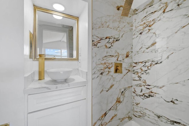 bathroom featuring vanity and walk in shower