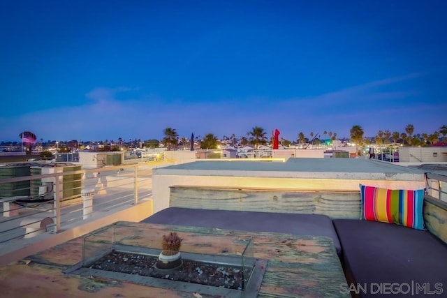 view of patio terrace at dusk