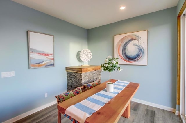 dining space featuring hardwood / wood-style floors