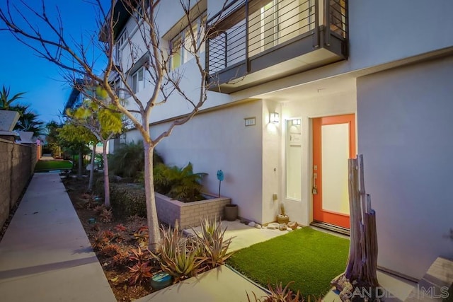 view of home's exterior featuring a balcony