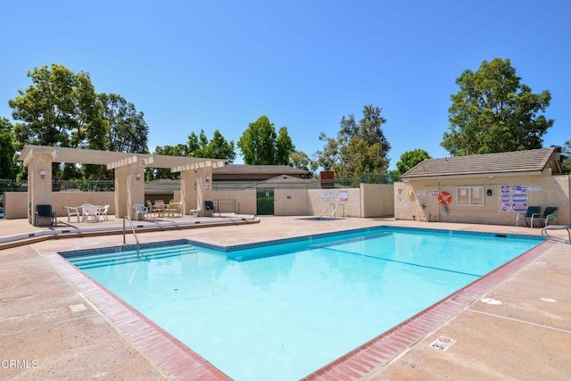 view of pool featuring a patio area and a pergola