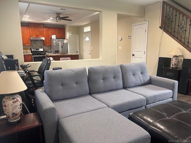 living room with ceiling fan