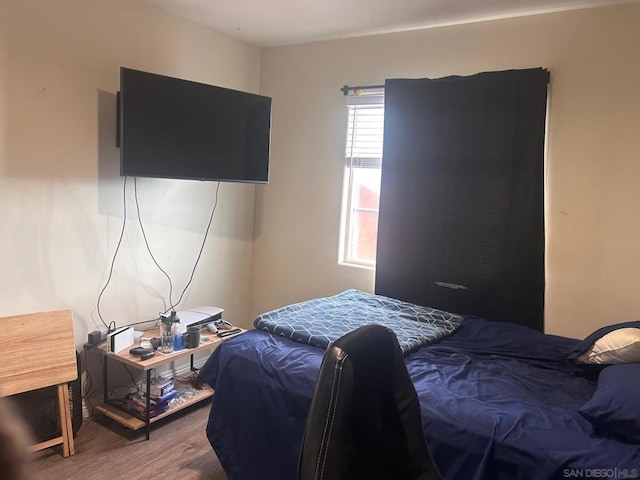 bedroom featuring wood-type flooring