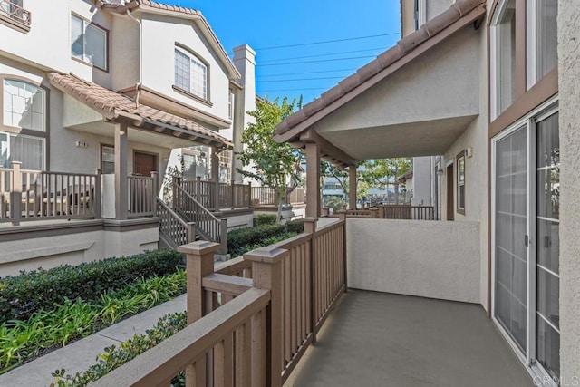 balcony featuring a porch