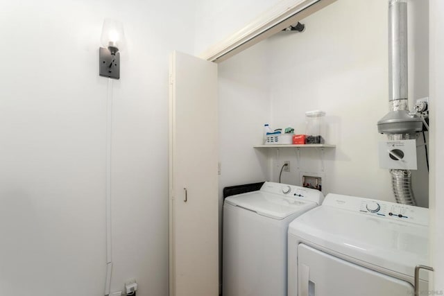 laundry room with separate washer and dryer