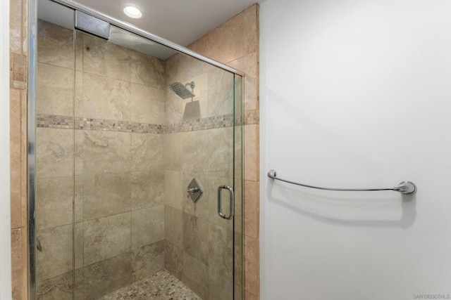 bathroom with an enclosed shower