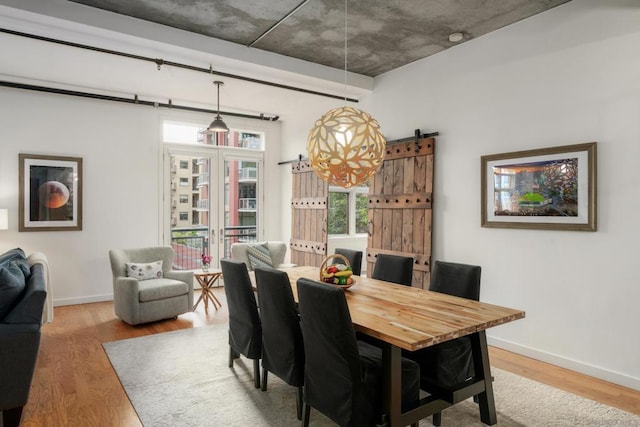 dining room with hardwood / wood-style floors