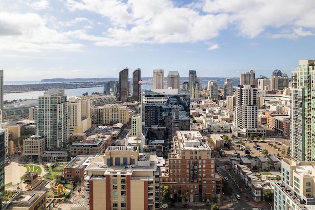 property's view of city featuring a water view