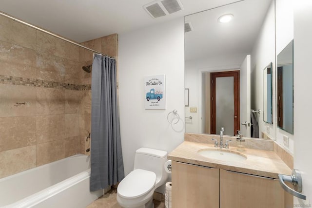 full bathroom featuring vanity, toilet, and shower / tub combo