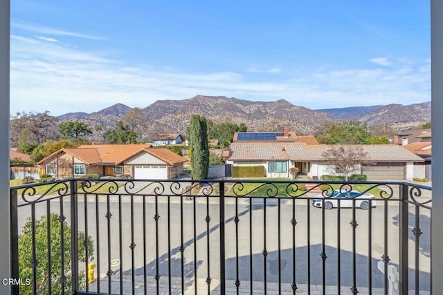 view of gate featuring a mountain view