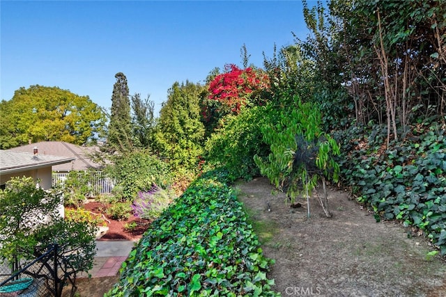 view of yard with fence