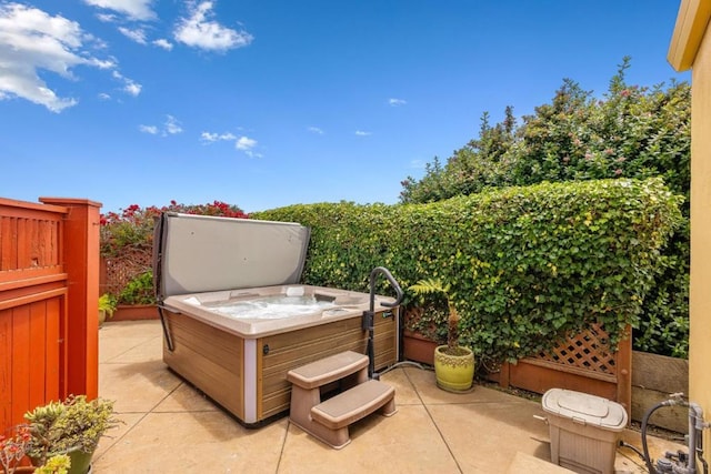 view of patio / terrace featuring a hot tub