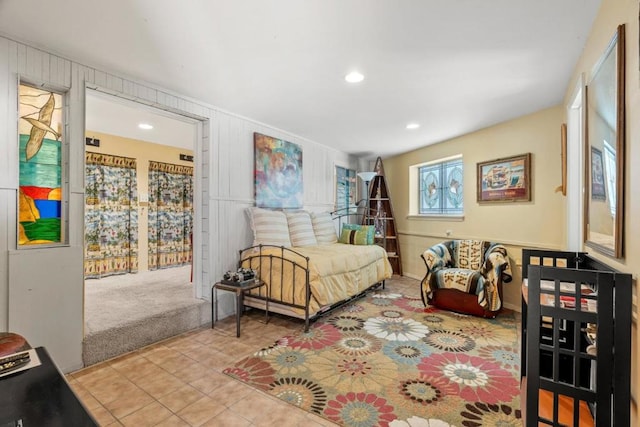 bedroom with light colored carpet