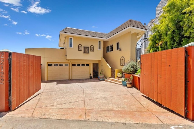 view of front of property with a garage