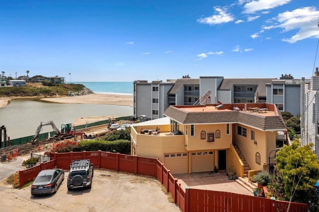 bird's eye view with a beach view and a water view