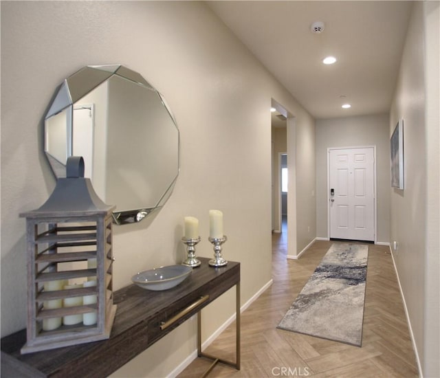 foyer featuring parquet floors