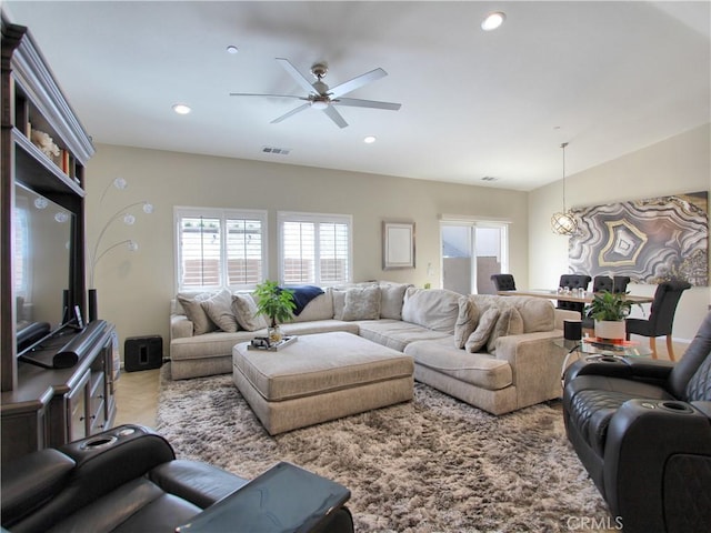 living room with ceiling fan