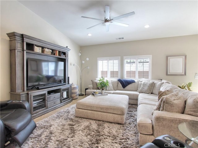 living room with ceiling fan