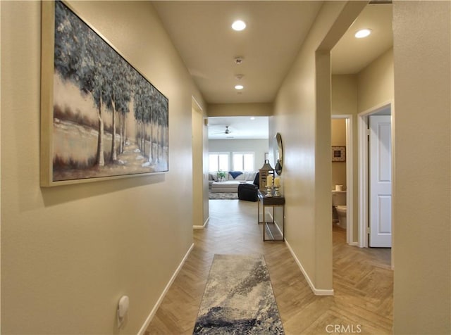 corridor featuring light parquet floors