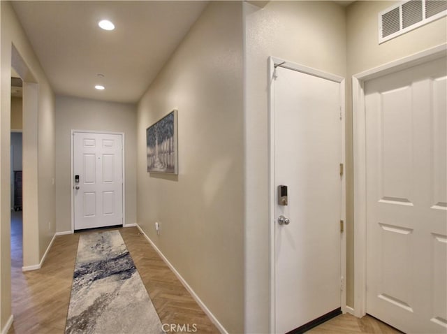 interior space with light parquet floors